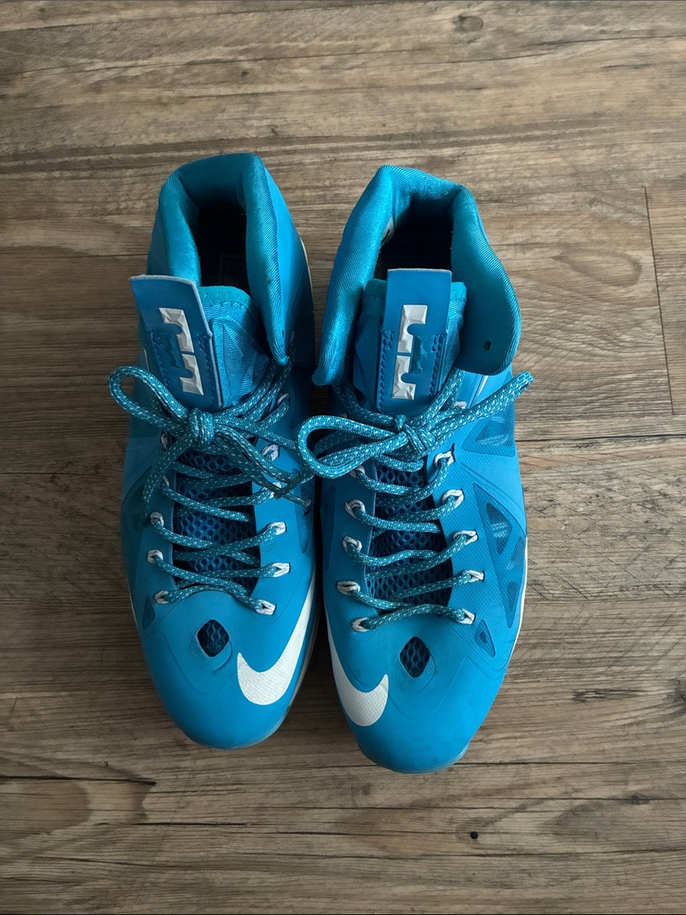 Nike Turquoise Basketball Sneakers with White Swoosh